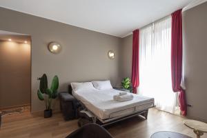 A bed or beds in a room at Moscova 50