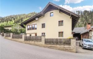 a house on the side of a road at Awesome Apartment In Obervellach With Wifi And 2 Bedrooms in Obervellach