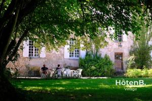 Vonkajšia záhrada v ubytovaní Le château du Fraysseix à Roziers-Saint-Georges