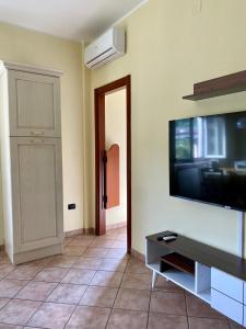 TV a/nebo společenská místnost v ubytování La Divina