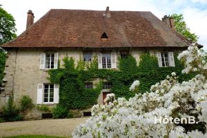 Vonkajšia záhrada v ubytovaní Le château du Fraysseix à Roziers-Saint-Georges
