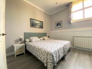 A bed or beds in a room at Casa de Los Carpinteros