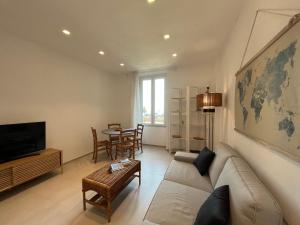 Et tv og/eller underholdning på Appartamento Aria di mare