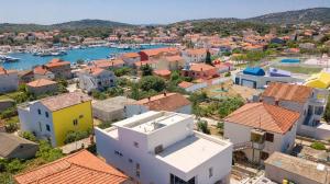 an aerial view of a town with a harbor at Vila Regina Apartment Rex with Swimming Pool in Jezera