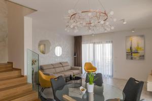Posedenie v ubytovaní Villa Magna luxury apartments