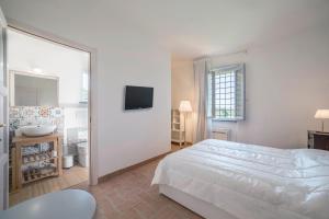 Katil atau katil-katil dalam bilik di Podere Belvedere Livorno