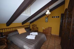 Posteľ alebo postele v izbe v ubytovaní Casa rural de estilo rustico con SPA