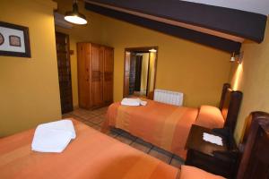 Posteľ alebo postele v izbe v ubytovaní Casa rural de estilo rustico con SPA