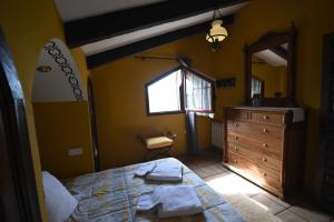 Posteľ alebo postele v izbe v ubytovaní Casa rural de estilo rustico con SPA