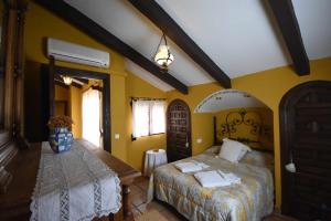 Posteľ alebo postele v izbe v ubytovaní Casa rural de estilo rustico con SPA