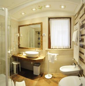 Phòng tắm tại Hotel Cesa Padon
