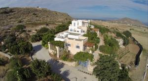 an aerial view of a house on a hill at Paros Tranquility Villa in Dhragoulás