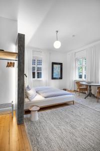 Ένα ή περισσότερα κρεβάτια σε δωμάτιο στο Fewo im Blauen Haus Eg