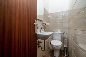 Ein Badezimmer in der Unterkunft Dijamant Apartment