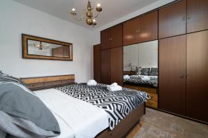 Ein Bett oder Betten in einem Zimmer der Unterkunft Dijamant Apartment