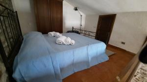 Postel nebo postele na pokoji v ubytování La Casetta + 7 fotografií