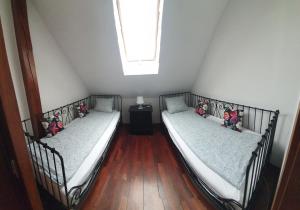 Posteľ alebo postele v izbe v ubytovaní Apartament STUDIO i Apartament ZADOMEK Spytkowice koło ZATORA