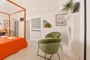 Ένα ή περισσότερα κρεβάτια σε δωμάτιο στο Corte Giotto Exclusive House