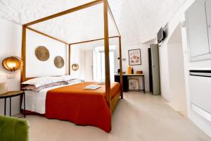 מיטה או מיטות בחדר ב-Corte Giotto Exclusive House