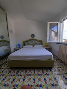 Postel nebo postele na pokoji v ubytování Casa Angela