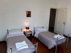 Postel nebo postele na pokoji v ubytování EasyRoom Piovene Rocchette + 14 fotografií