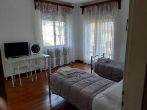 Postel nebo postele na pokoji v ubytování EasyRoom Piovene Rocchette