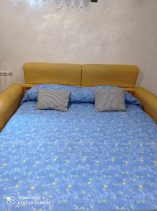Katil atau katil-katil dalam bilik di Casa vacanze Lulù