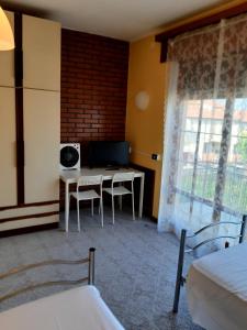 Posezení v ubytování EasyRoom Piovene Rocchette