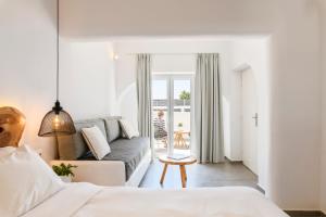 Posteľ alebo postele v izbe v ubytovaní Casa Anna Suites + 37 fotografií