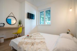 Postel nebo postele na pokoji v ubytování Sweet rooms