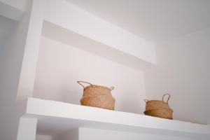 Photo de la galerie de l'établissement Muses Apartments, à Agía Ánna