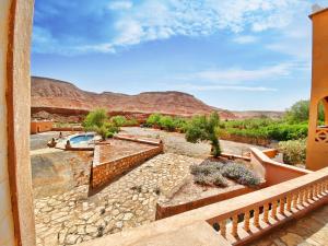 a view of the desert from the balcony of a house at Guest House Defat Kasbah in Aït Benhaddou