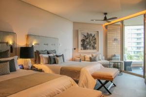 Кровать или кровати в номере Secrets Moxché Playa del Carmen - Adults Only - All Inclusive