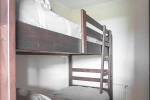 Ένα ή περισσότερα κρεβάτια σε δωμάτιο στο Excelente Departamento en Condominio Costa Pucon +50 φωτογραφίες