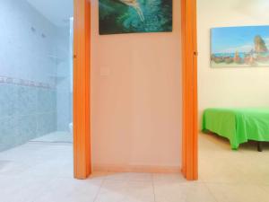 Postel nebo postele na pokoji v ubytování AyF 1ª LINEA DE PLAYA ISLA PARK 1