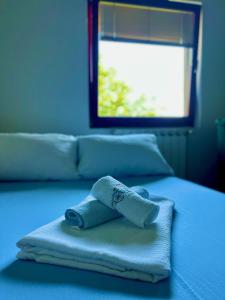 Posteľ alebo postele v izbe v ubytovaní Apartman Amila