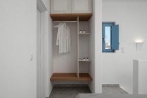 Koupelna v ubytování Camvillia Donoussa Village Suites