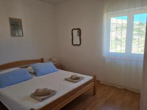Apartments Zakarija客房内的一张或多张床位