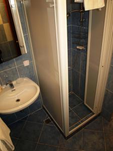 Ванная комната в Hotel Liechtenstein Apartments II