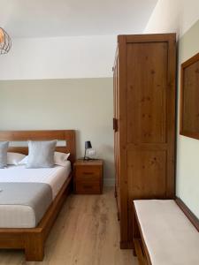 Postel nebo postele na pokoji v ubytování VILA 8