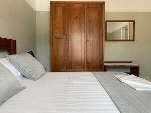 Postel nebo postele na pokoji v ubytování VILA 8