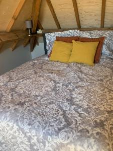 a large bed in a room with at Het Dijkje Utrecht in Utrecht +79 photos