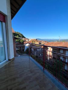 a balcony with a view of the ocean at La Panoramica in Colazza