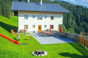 Vonkajšia záhrada v ubytovaní Grassbichlhof