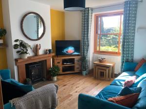 TV o dispositivi per l'intrattenimento presso Lazy Daze Cottage