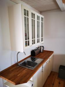 Η κουζίνα ή μικρή κουζίνα στο Ferienhaus Muschel +21 φωτογραφίες