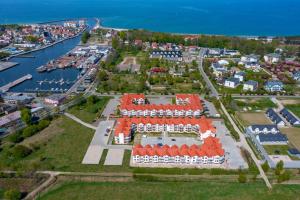 an aerial view of a harbor with a marina at Apartament ALGA2 in Darłowo