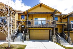 a house with a balcony and a garage at West Wintercress Dream in Heber City