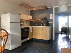 A cozinha ou cozinha compacta de The Guesthouse by the Fjord