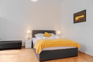 A bed or beds in a room at Pleasing 2BR Apt. AKH-Perfect for Groups